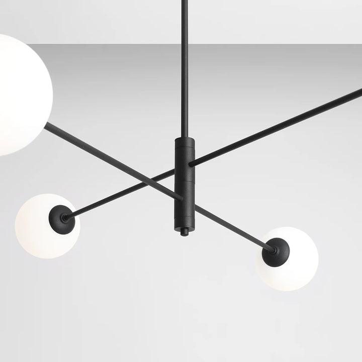 Lustra neagra cu 4 lumini asejate pe 2 tije orizontale Homme by Aldex
